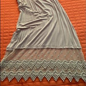Lace slip worn under short dress/tunic